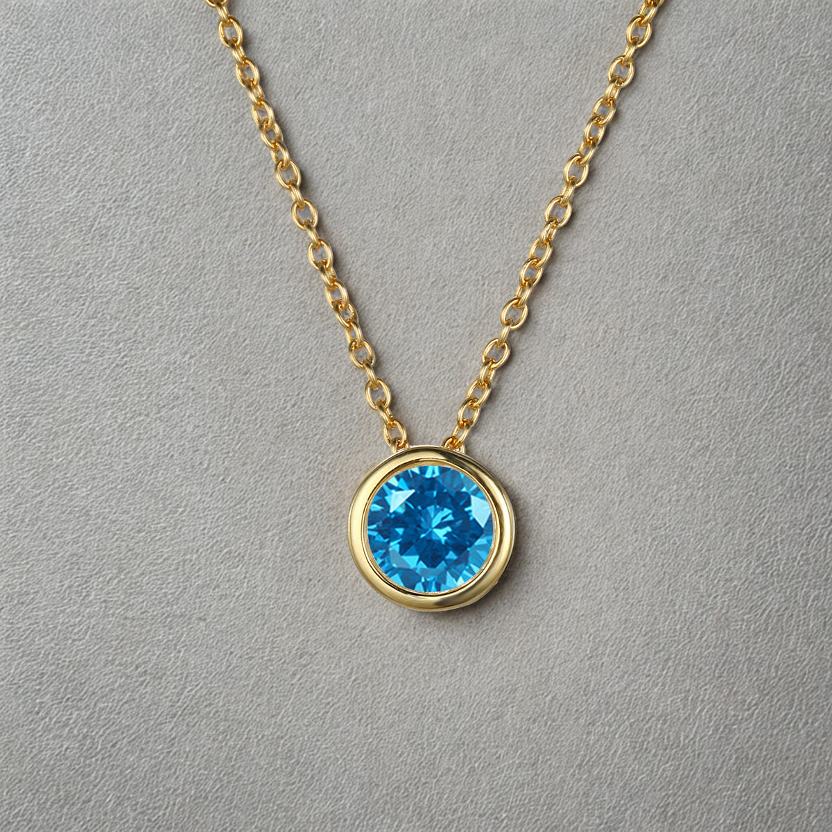 Aquamarine / December (Light Blue) Round Birthstone Necklace with a Gold Chain