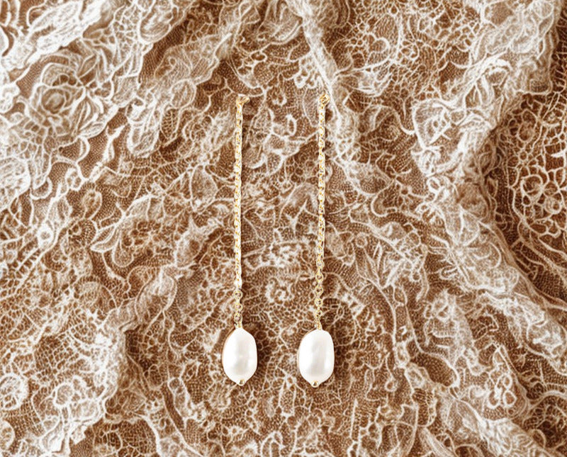 Freshwater Pearl Dangle Earrings – Gold, or Silver. Gold-tone long chain freshwater pearl dangle earrings on lace