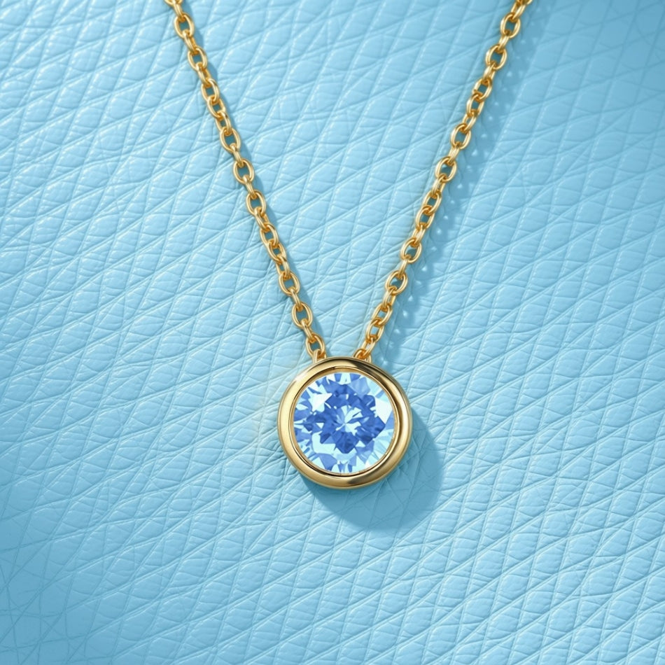 Light Sapphire / March (Sky Blue) Round Birthstone Necklace with a Gold Chain