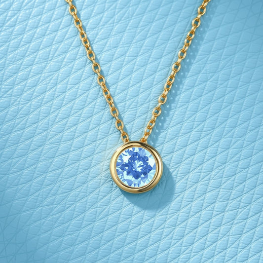 Light Sapphire / March (Sky Blue) Round Birthstone Necklace with a Gold Chain