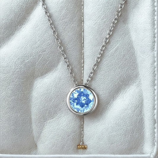 Light Sapphire / March (Sky Blue) Round Birthstone Necklace with a Silver Chain